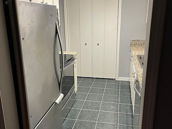 Kitchen looking at pantry