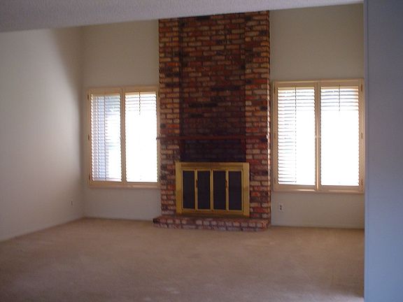 living room with fireplace and wet bar, 