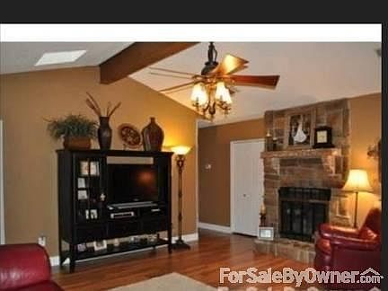Living Room w/ Fireplace & Skylights
						:
						L.R. has fireplace & 2 skylights. Concrete floors ready for owner's choice.
