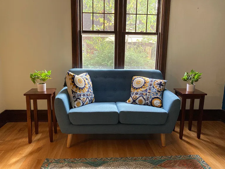 View of the family room, with a window on side of the house.