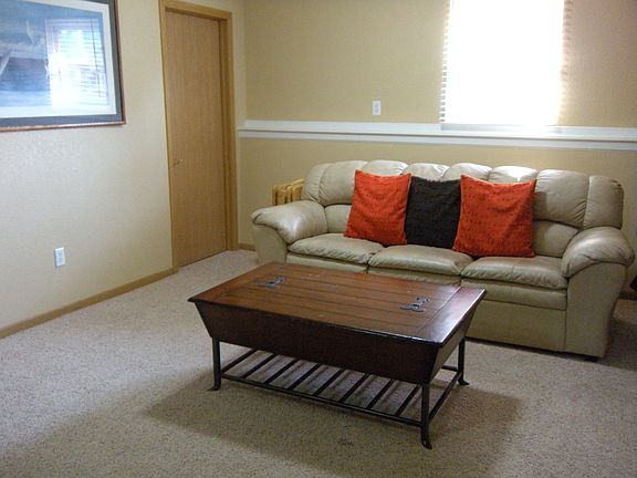 Carpeted fully-finished basement (furniture not included)