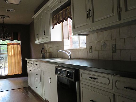 Galley kitchen sink view