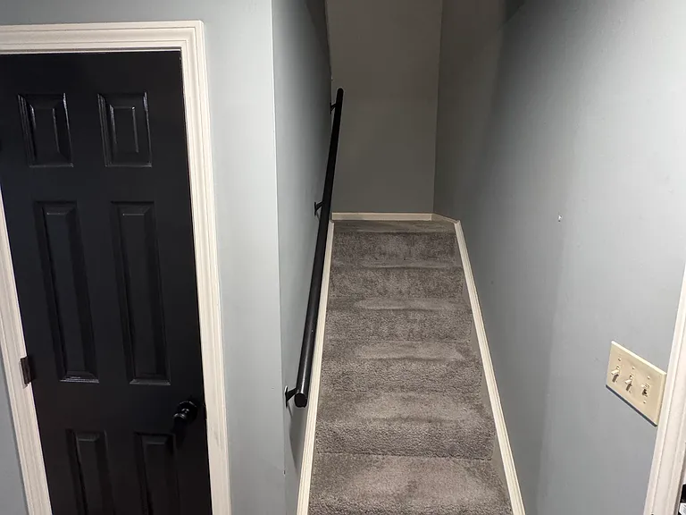 Stairway to the Right of the front entrance