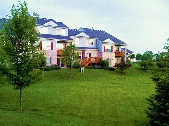Backs to quiet open area (maintained by association); Accessible from raised deck