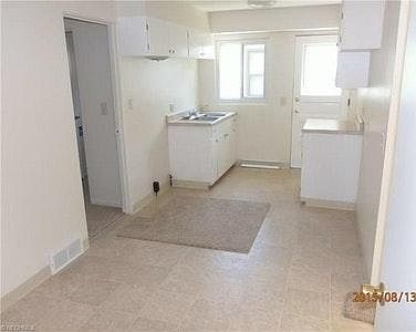 kitchen (currently has new stove and refrigerator)