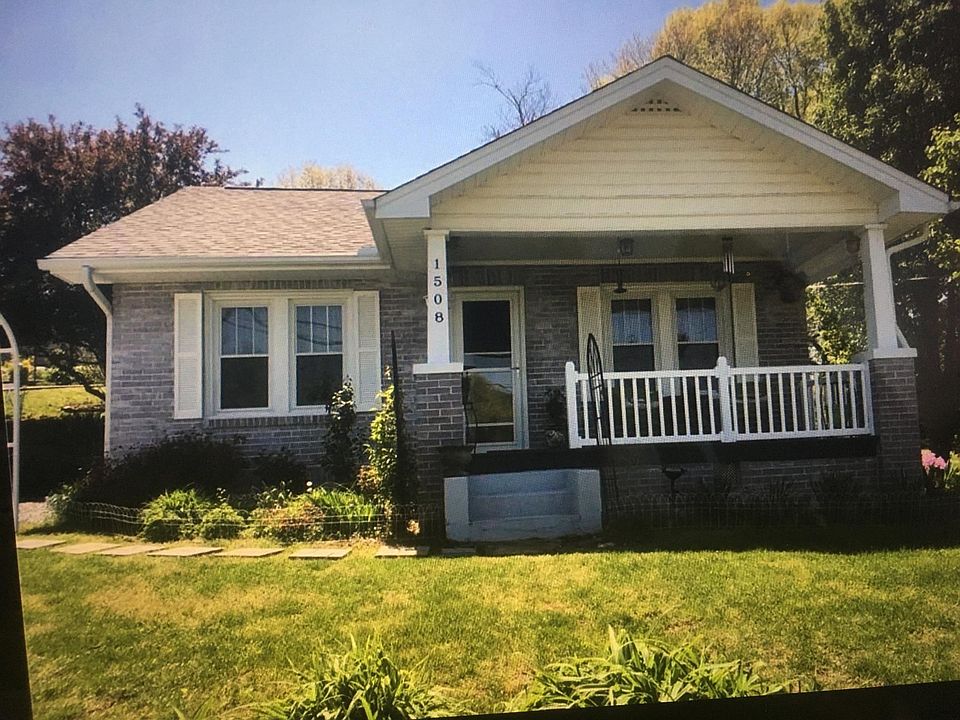 Great quiet street with view of meadow and rocking front porch