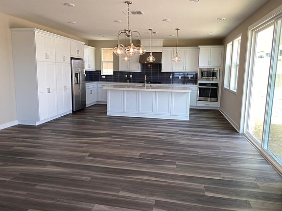 Spacious open kitchen. dining and living area.