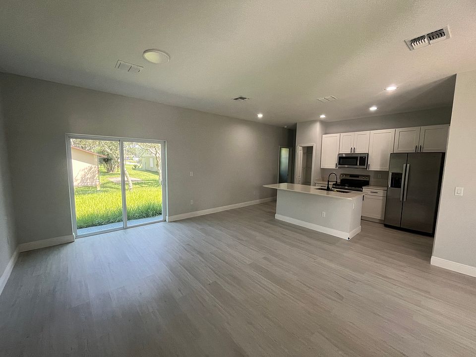 Living room and kitchen view from front door
