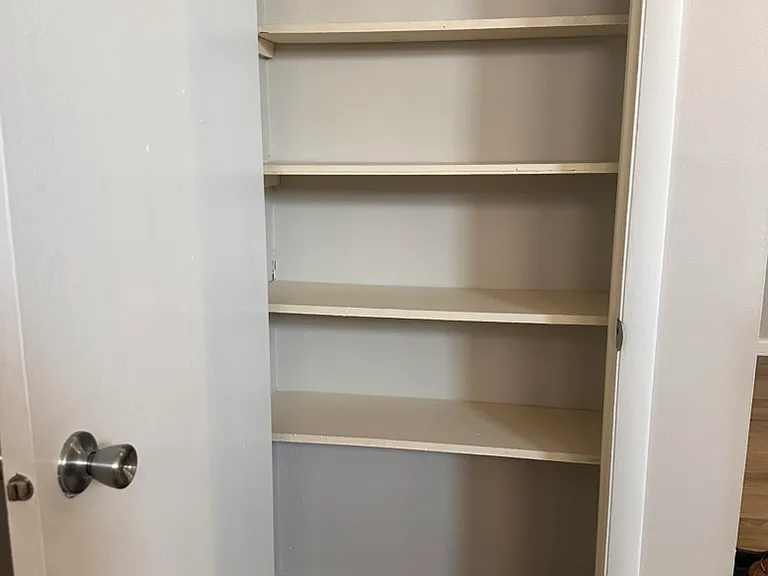 803 - closet located in the living room