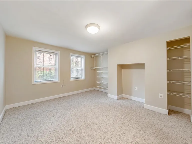 Big bedroom allows for different room configurations. Lovely view of garden.