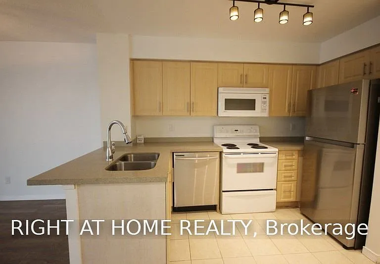 30 Harrison Garden Blvd #207 — Photo 2