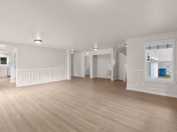 Huge living room with coat closet and laundry room off the garage.