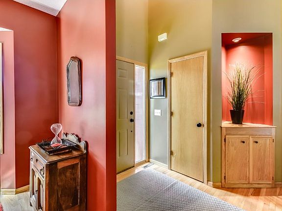 Custom woodwork and trim throughout home.  Vaulted ceilings and recessed lighting.