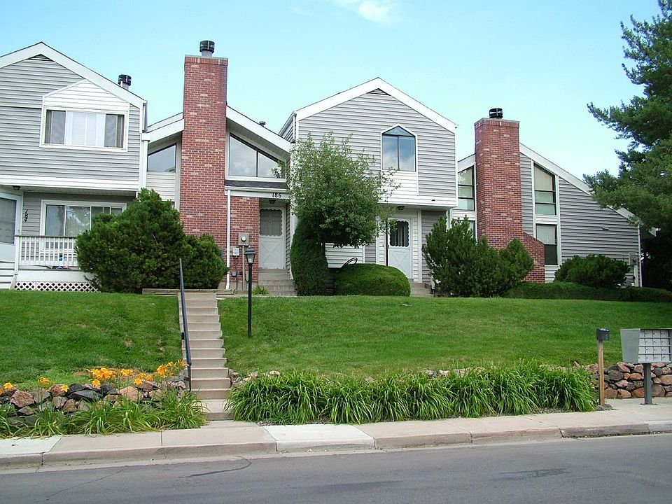 Front shows mature landscaping