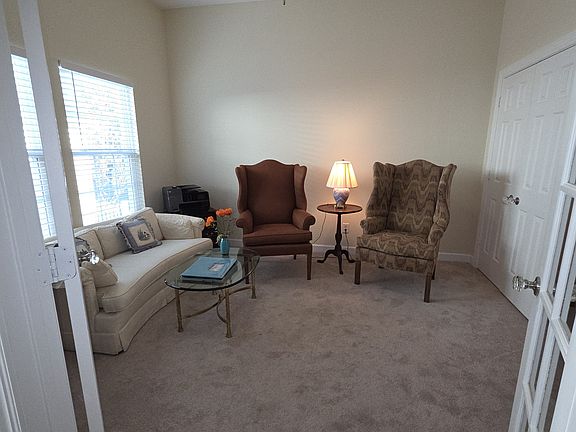 Living room, office or third BR. Double door closet on the left. Glass French doors.