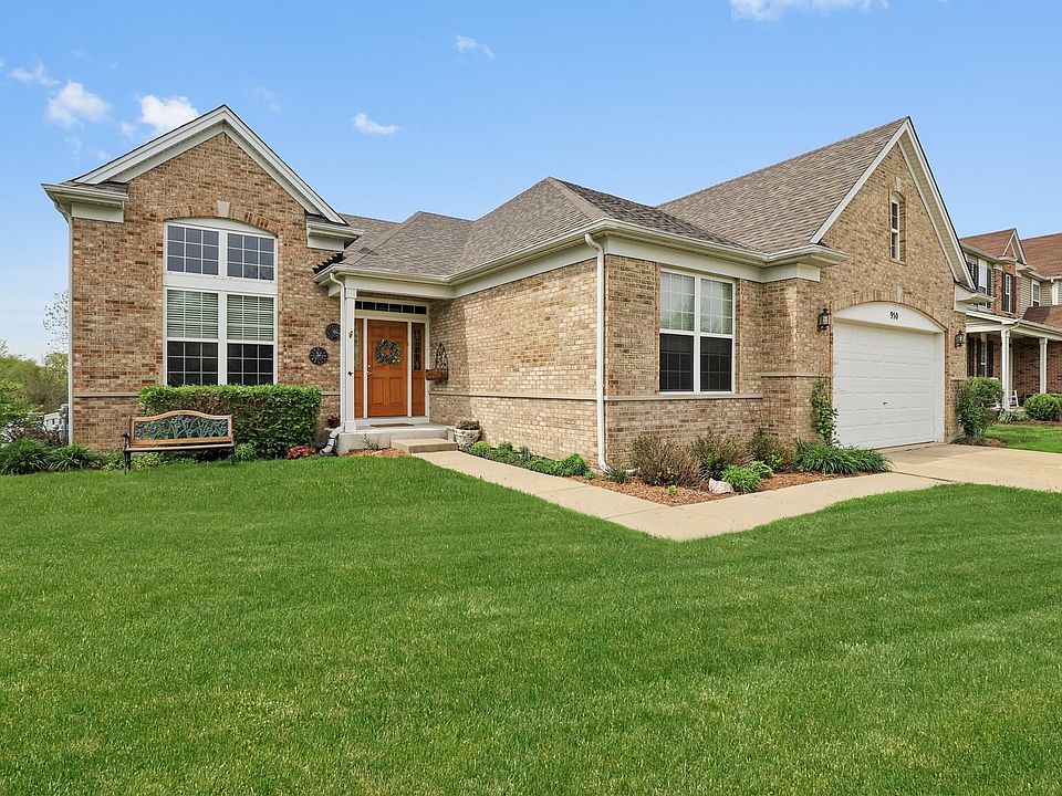 Brick front with Low Maintenance Siding Makes Home Ownership a Breeze. In Addition, the Driveway Is 