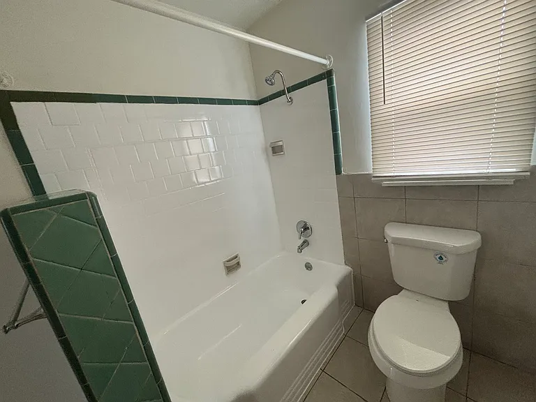 Bathroom. Window looks out to back yard.