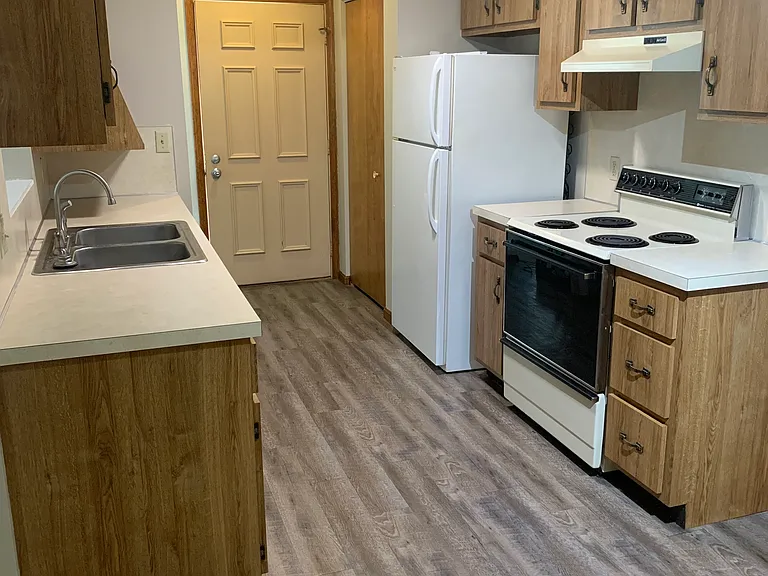 Front door and coat closet