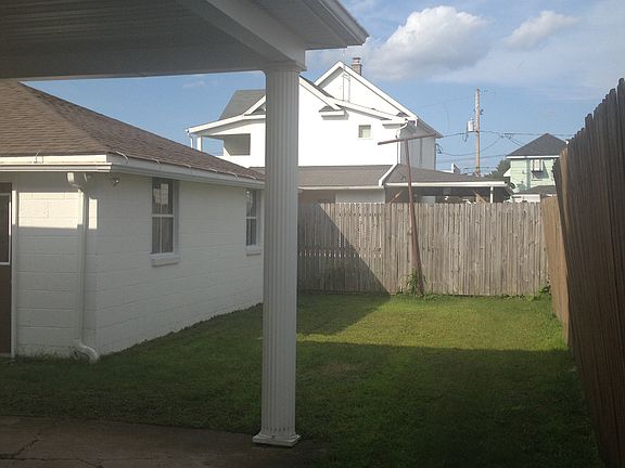 Partially fenced in backyard