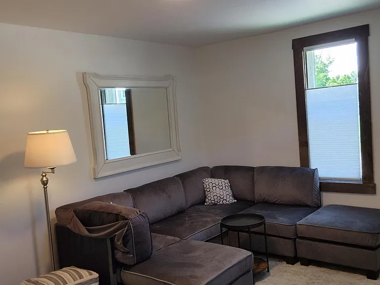 Sofa in Living Room converts to Queen Size Bed