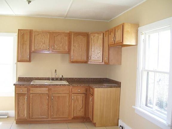 New cabinets, countertop and ceramic floor