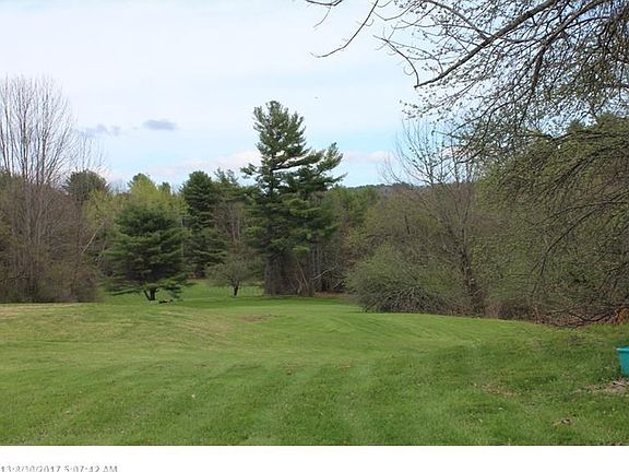 Acres of beautiful rolling fields perfect for horses, an organic garden, or just a stroll on a summe