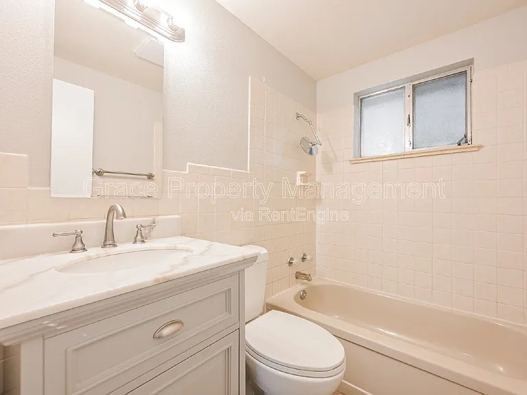 1500 W 50th Ave — Photo 13