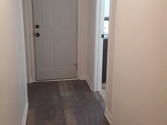 Backdoor corridor, connecting bedroom and bathroom