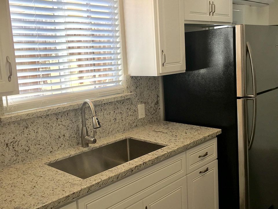 cabinets include pull out trash bin