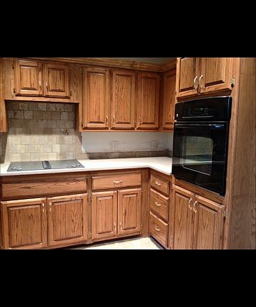 Kitchen with glass/stainless steel appliances