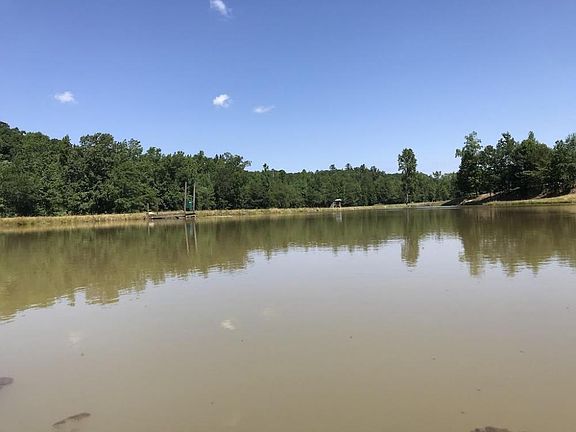 Stocked Pond on Edge of Food Plot on +/-80 Acre Kemper County, MS Hunting and Recreational Property With Custom Cabin and Pond