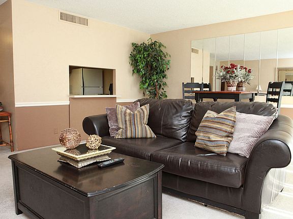 A pass-through between the kitchen and living area allows for easy entertaining.