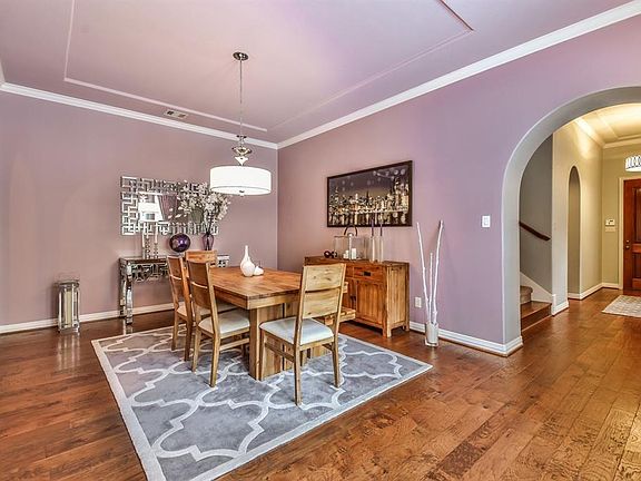 Enjoy elegant dining and large dinner parties. Stunning formal dining room with beautiful hardwood floors and easy access to the butler's pantry