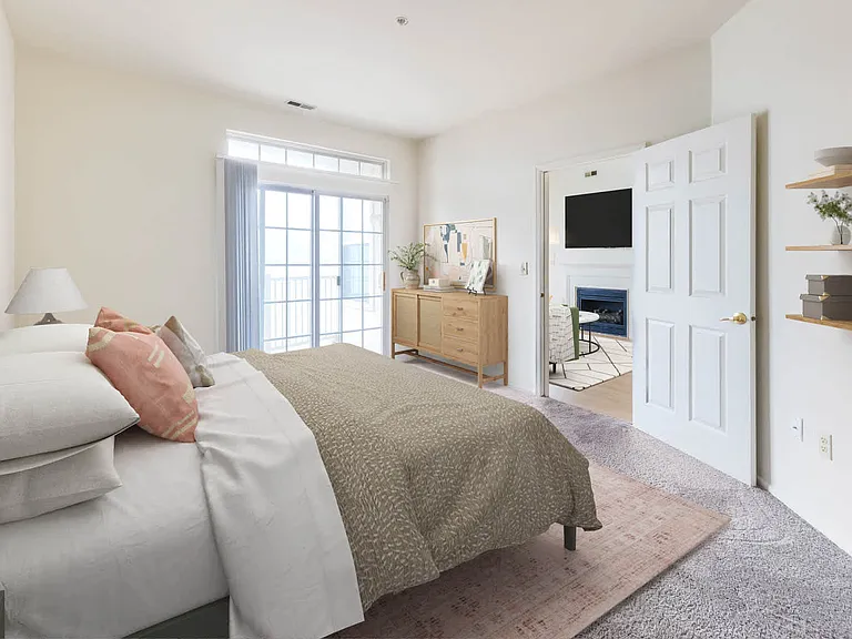 Carpeted Bedroom with Balcony