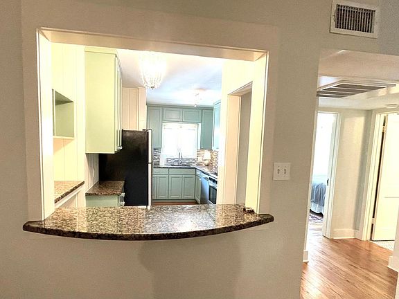 Kitchen pass through to dining