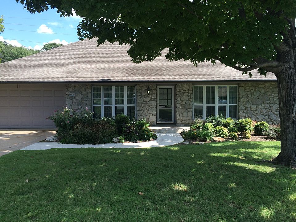 Grey stone & landscaping!