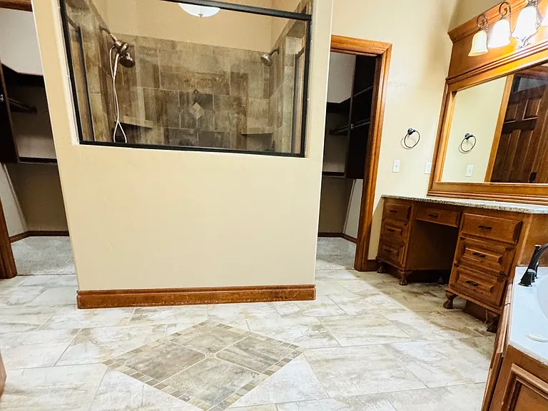 Master Bathroom with 2 head standing shower.