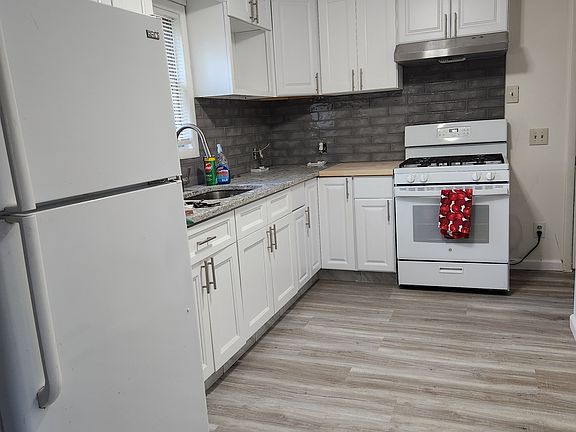 Brand new kitchen with gas stove and butcher block