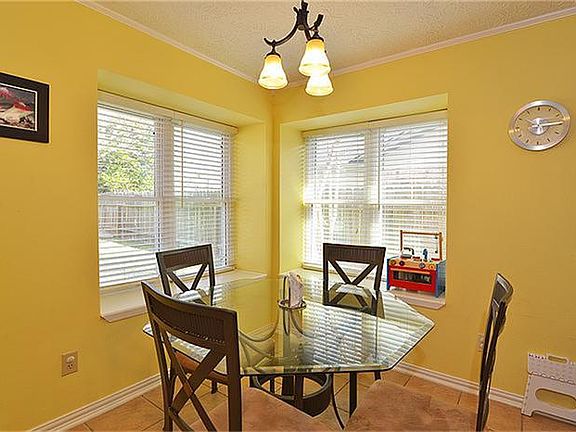 Bright, light, and right off the kitchen enjoy every morning in this convenient breakfast nook.