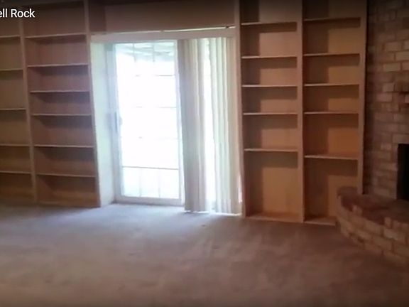 Storage is not an issue in this house. This living room full