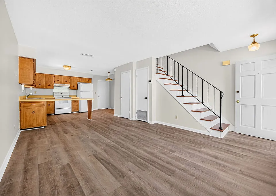 Spacious living room with new LVP flooring