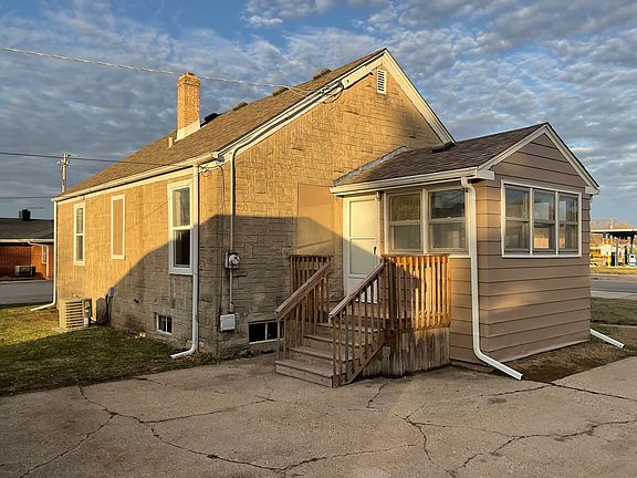 South facing side of home, rear entrance thru 3 season room . All new flooring and freshly painted!