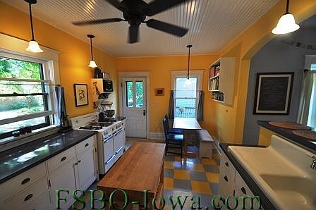 Beadboard ceiling, farmhouse sink, antique stove