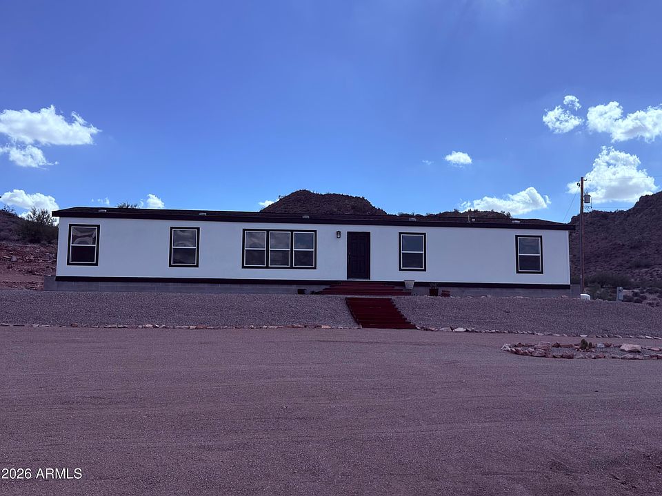 1st image of 6135 E 34TH Avenue