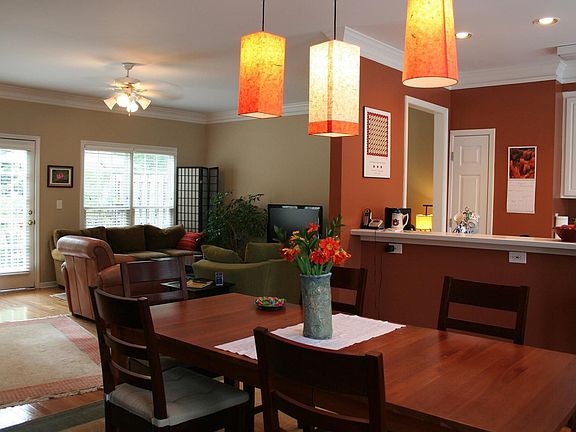 Dining Room Looking into Kitchen, Living Room and Deck