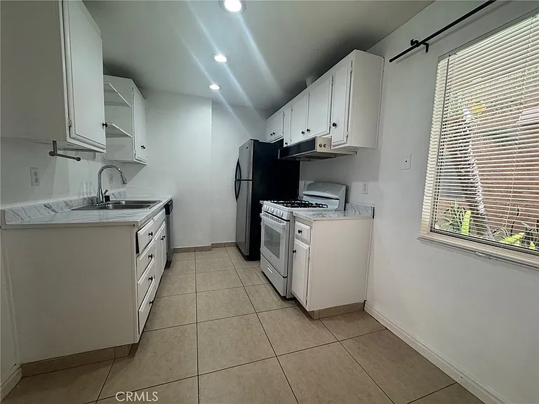 6600 Warner Ave #115 — Photo 8
