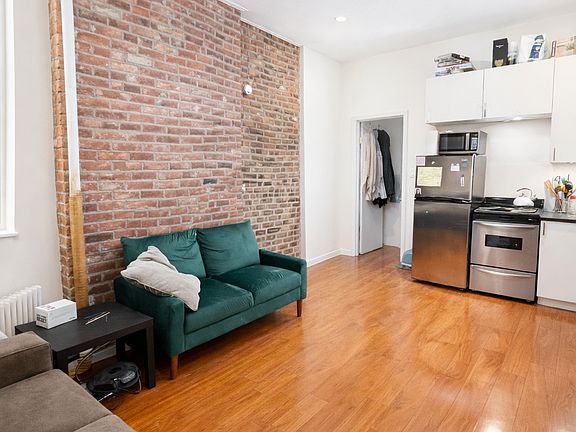 3rd image of 254 E 3rd St APT 12