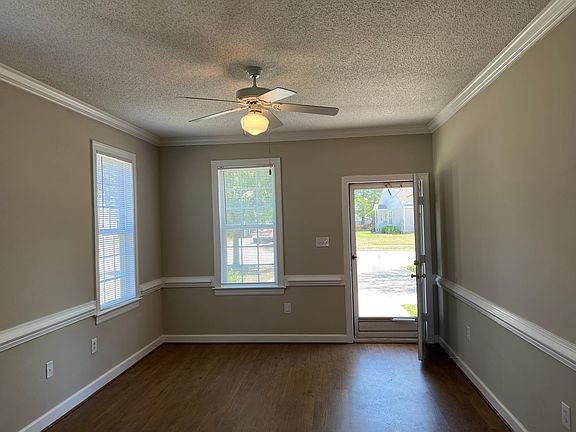 New LVP Plank Flooring in living room. Walls painted the popular color agreeable gray!