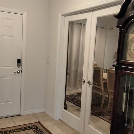 Double french doors to den