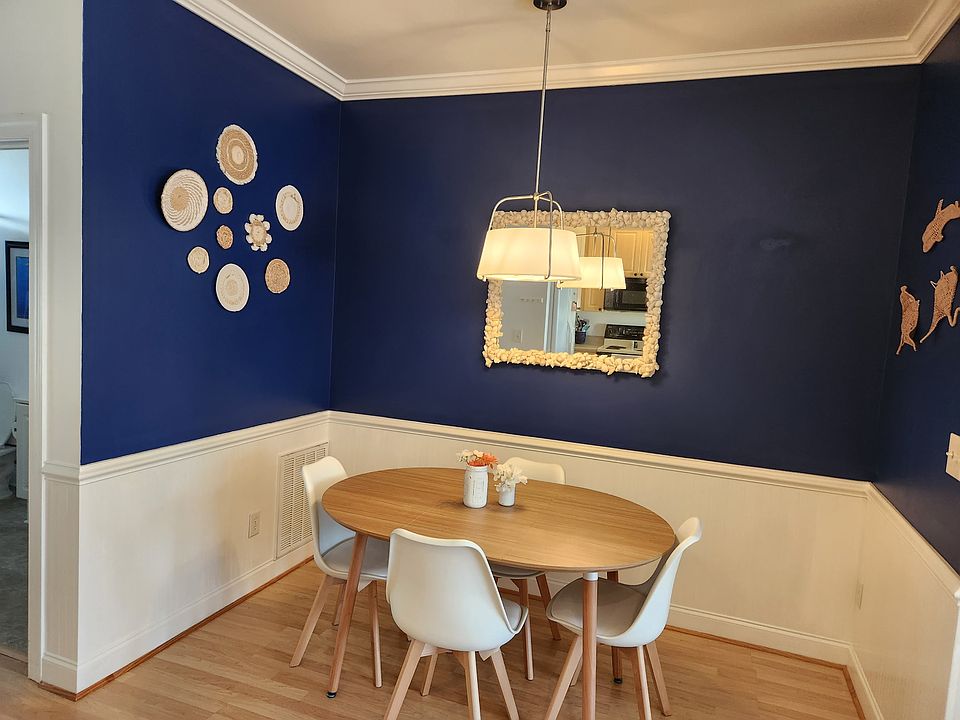 Dining area. The table extends and comes with extra chairs.